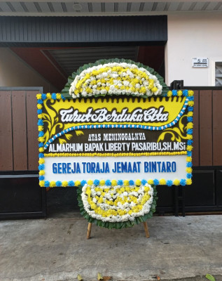 Papan Bunga Duka di Jelbuk
